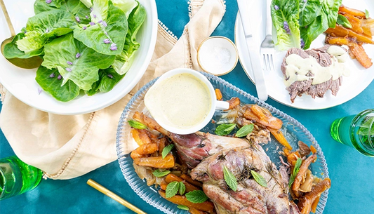 Roast lamb with baby carrots and salad