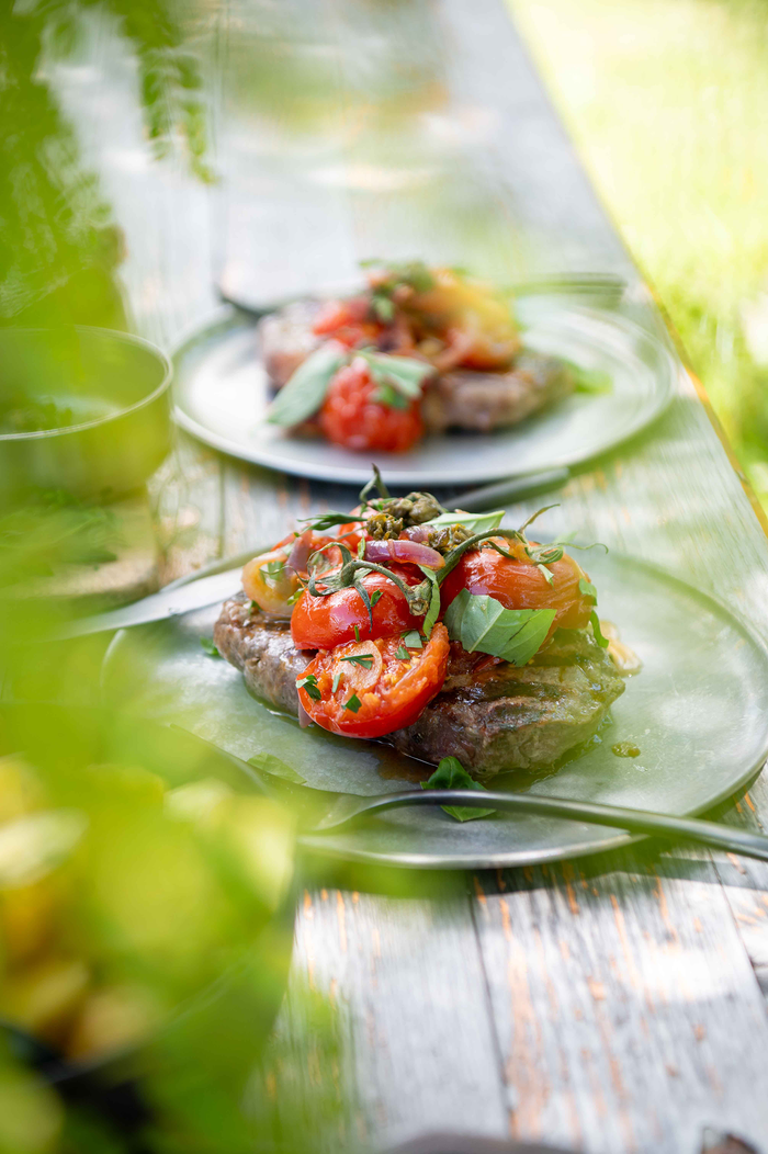 Angus Beef Steak with tomatoes on top