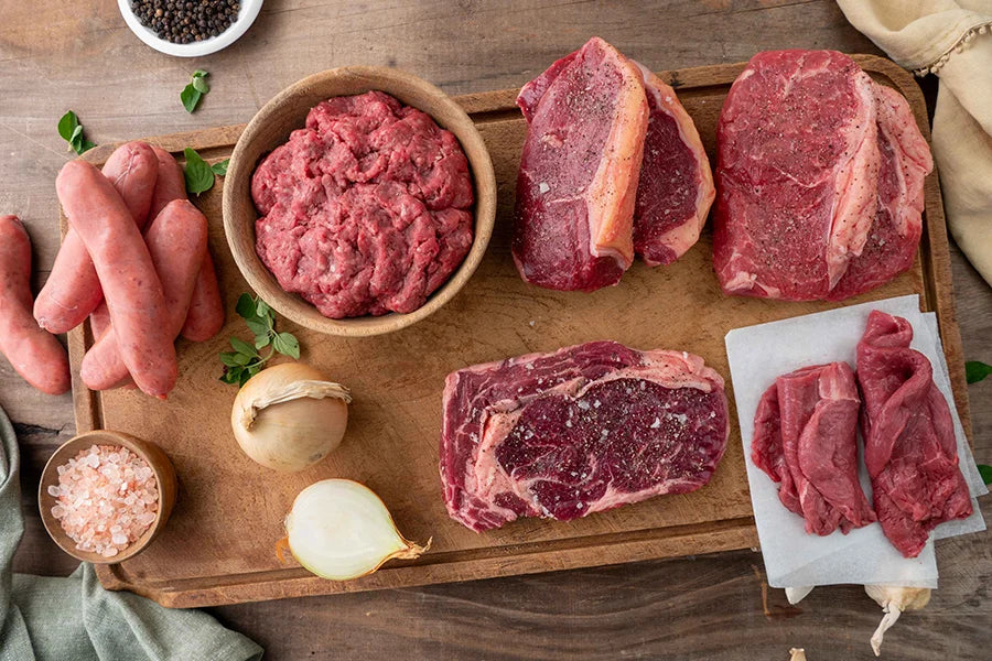 Chopping board with raw angus beef styled on top