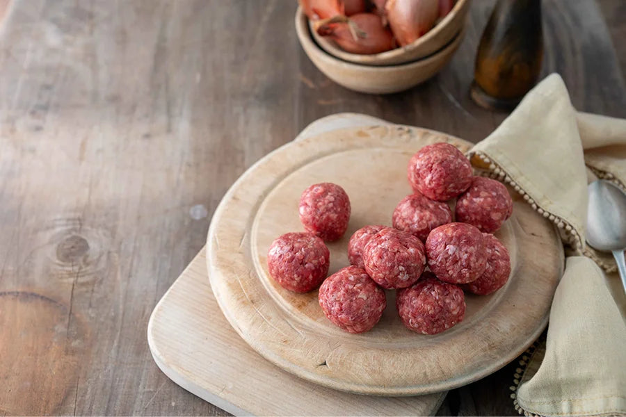 Angus Beef meatballs on a chopping board