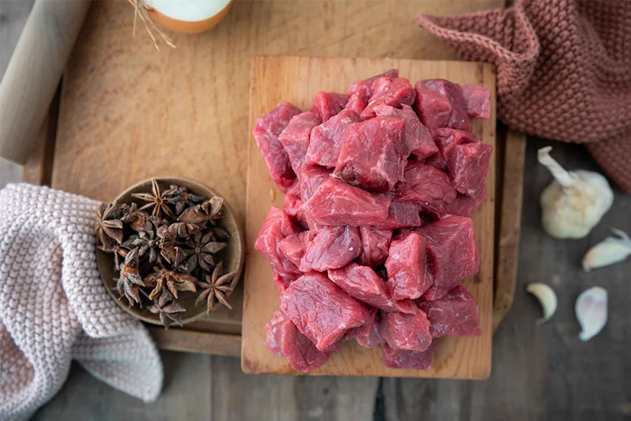 diced angus beef and a bowl of star anise