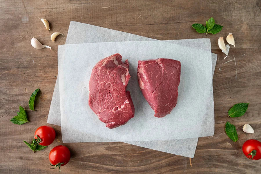 eye fillet steaks on baking paper