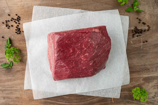 Angus Beef Topside Roast on kitchen table