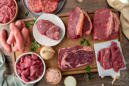 An assortment of Beef cuts laid on a chopping board